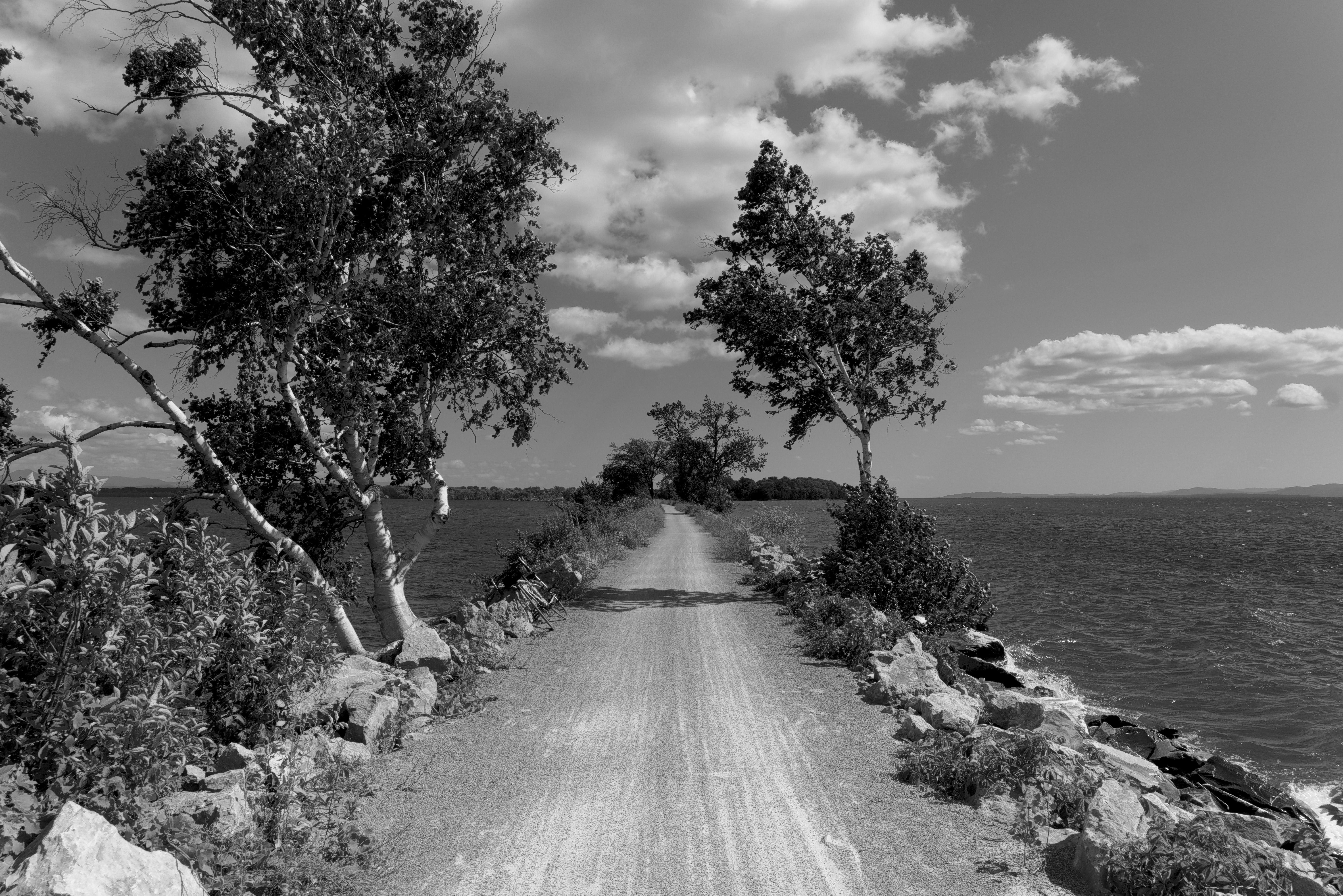 A b&w photo of the causeway in Colchester VT